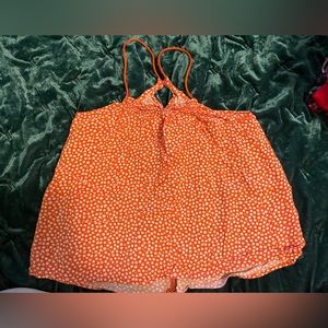 This is a orange crop top, size x-small (1).